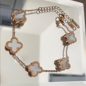 Elegant Gold and White Clover Bracelet